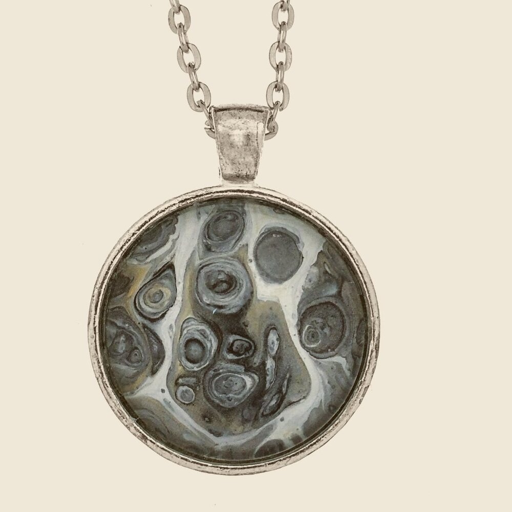 Fluid Art Pendant in Gray & White with a silver-plated necklace 18" long.